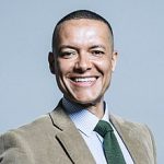 Head and shoulders picture of Clive Lewis smiling